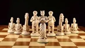 A chess board with some figurines on it